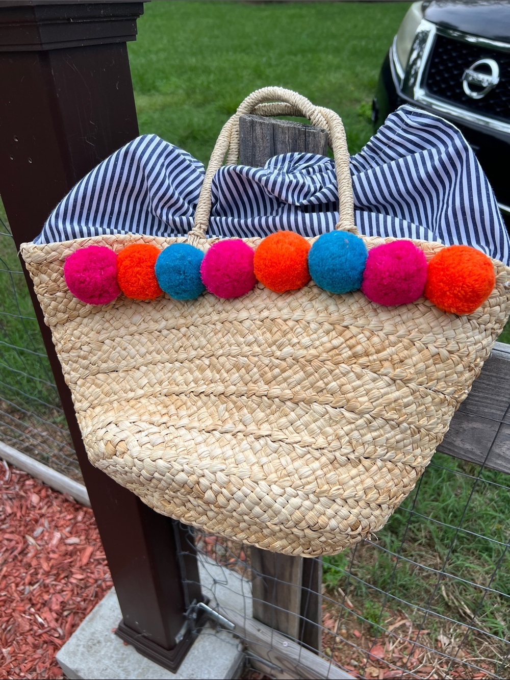 Handwoven Straw Kids Tote with Pink, Orange & Blue Pom-Poms
